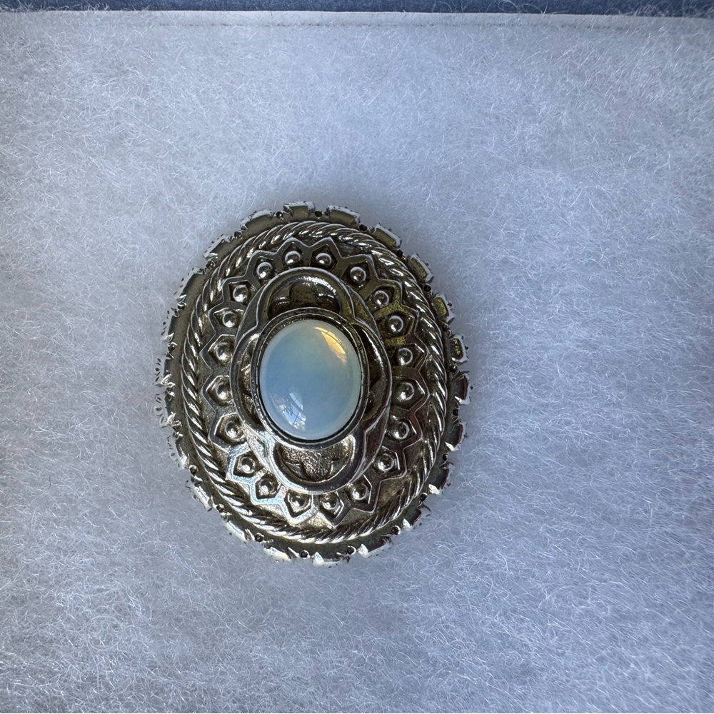 Silver brooch purchased at the Vatican.